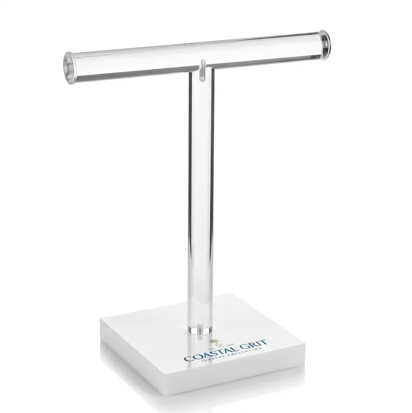 Clear acrylic T-bar necklace display stand with white base and custom brand logo for retail showrooms.