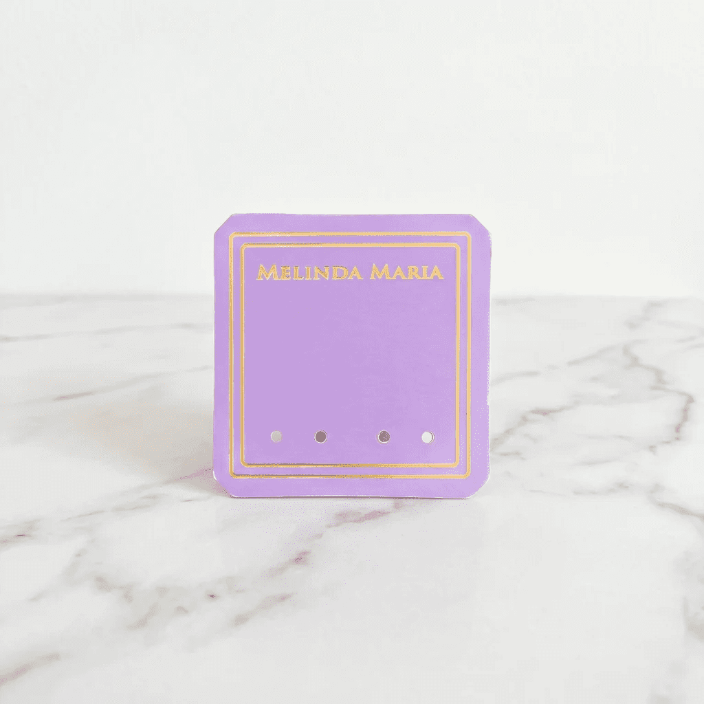 Custom 700g cardboard earring cards with die-cut holes and gold foil logo for luxury jewelry branding