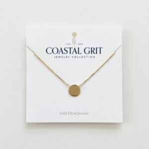 Custom 700g cardboard necklace cards with die-cut slots for earrings and studs, featuring offset printing and brand logo.