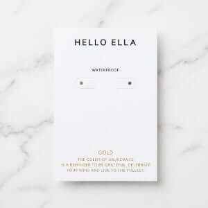 Custom 700g cardboard earring cards with two die-cut holes for studs and bracelets, featuring high-quality offset printing.