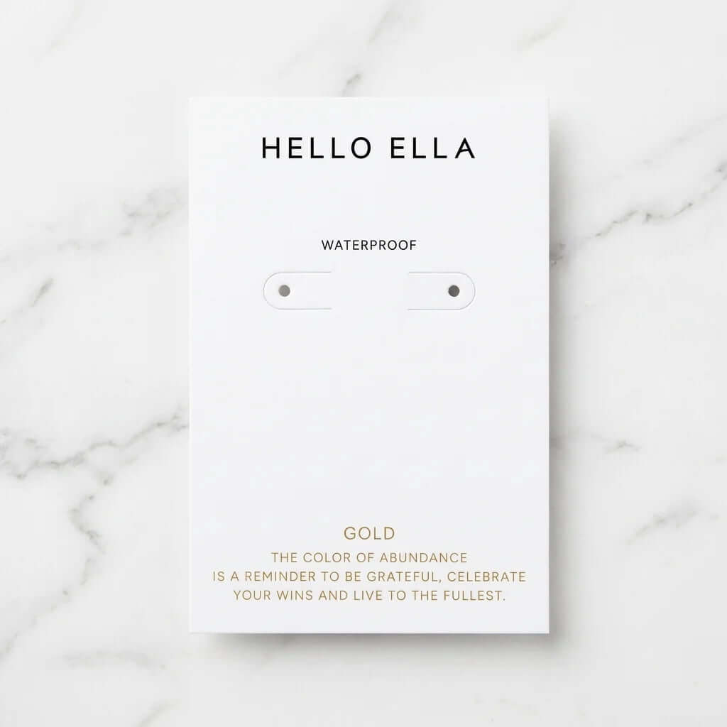 Custom 700g cardboard earring cards with two die-cut holes for studs and bracelets, featuring high-quality offset printing.