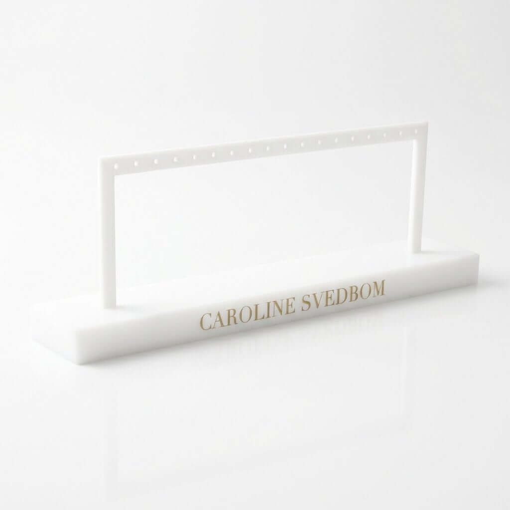 White acrylic earring display stand with 18 holes and stable detachable base for 9 pairs of earrings.