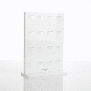 White acrylic earring display stand featuring double-sided hanging holes for studs and pendants with a sturdy detachable base.