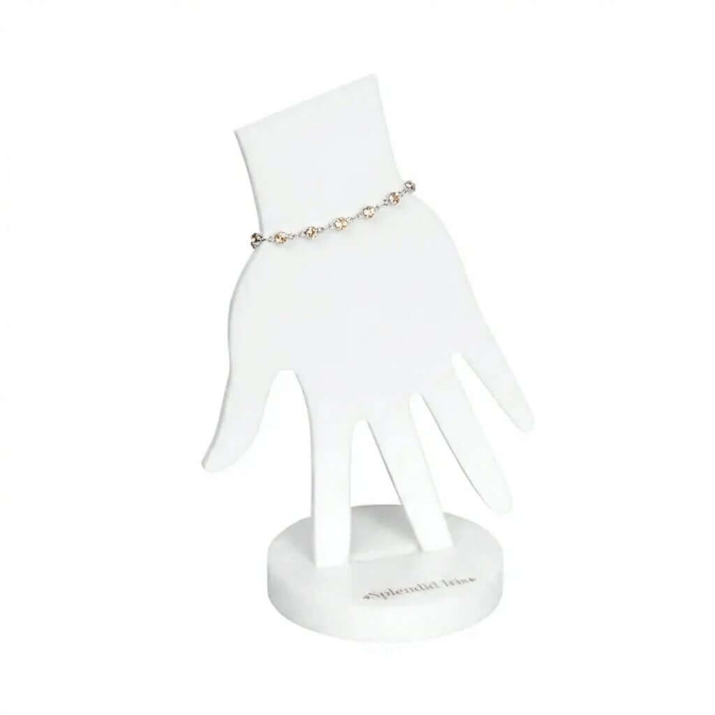 White acrylic hand display stand for bracelets featuring a 5x8 inch base with custom engraved logo.