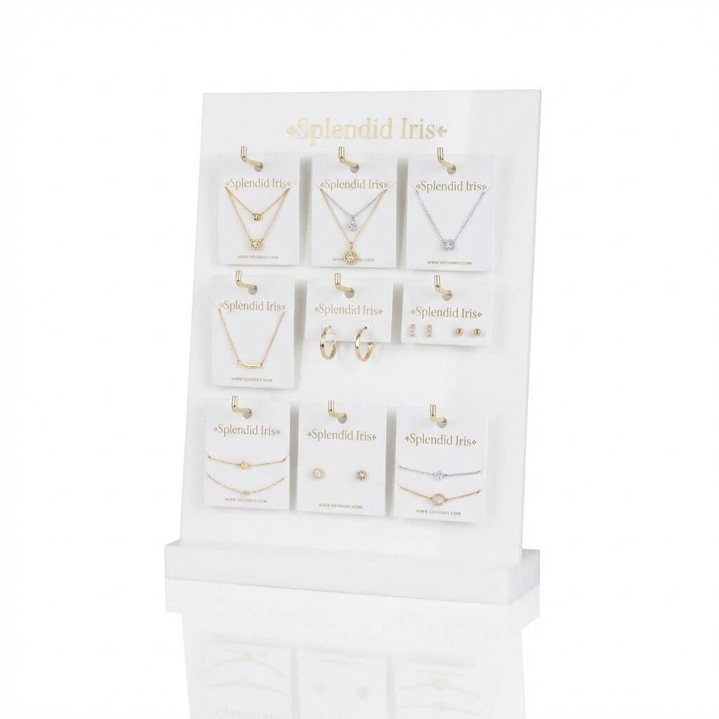 Countertop white acrylic jewellery card display stand with 9 gold hooks for retail earring and pendant cards.