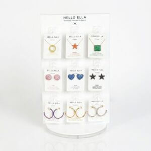 Minimalist white acrylic rotating jewelry display stand with transparent hooks for earring cards and retail merchandising.